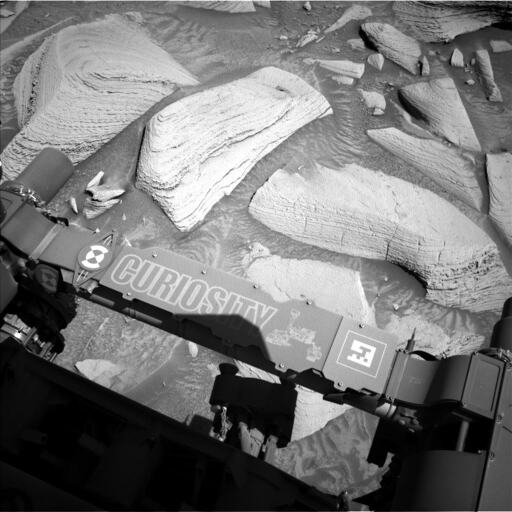 This image shows the rover's rocky and sandy workspace, it covers an area about 2 meters (~6.5 feet) across, and shows details within the workspace accessible to the instruments and tools on the rover's 2 meter-long robotic arm. Image Credits: NASA/JPL-Caltech