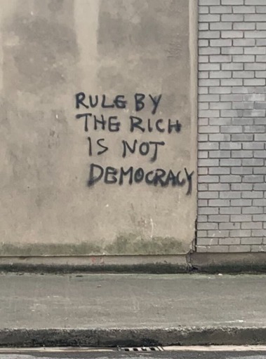 Graffiti Rule by The Rich Is Not Democracy